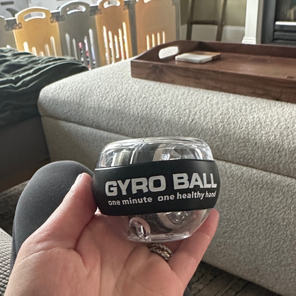 GYRO BALL Hand Exerciser - Black/Clear